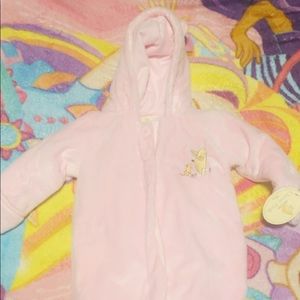 A baby jump set zips up